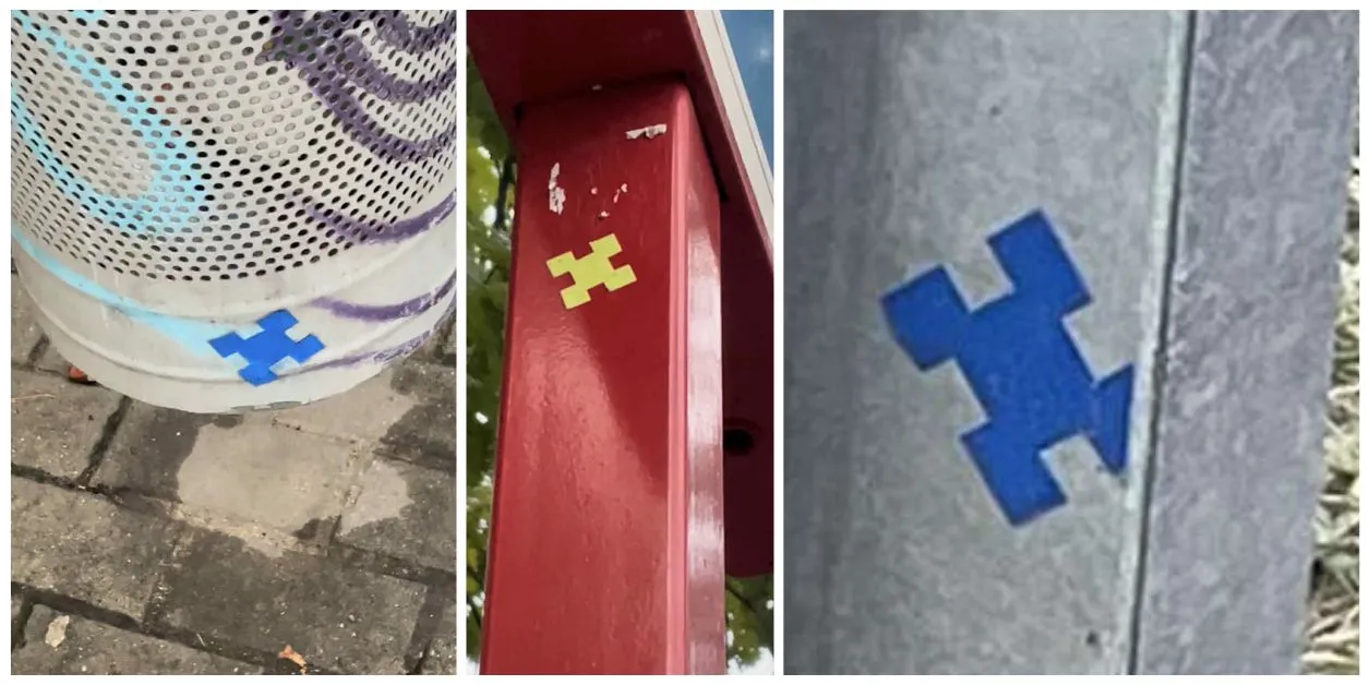 Tajemnicze naklejki na znakach i tablicach